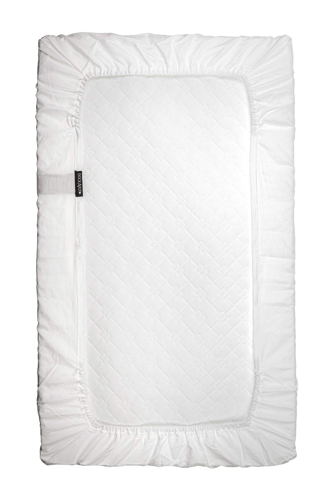 White quilted Kind Essential Bassinet fitted sheet by DockATot with a distinct perimeter border and a side zipper, made from safe bassinet fabric, placed against a plain background.