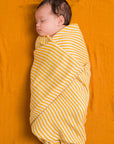 THE OUTLET: DockATot Swaddle Set - Golden Stripe / Pumpkin Spice